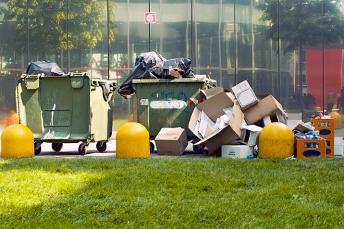 Waste clearance truck removing construction debris